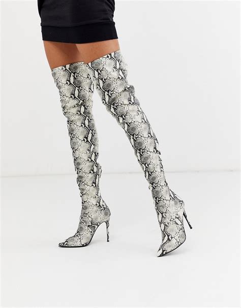 Amazon.com: Steve Madden Snake Boots.